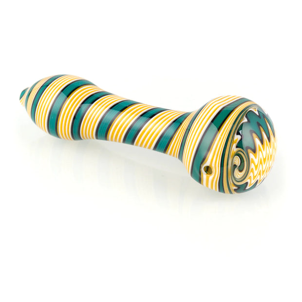 bottom side of green and yellow glass hand pipe