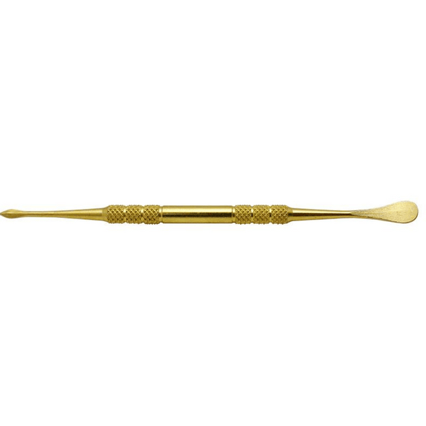 sideview of a gold dabber tool
